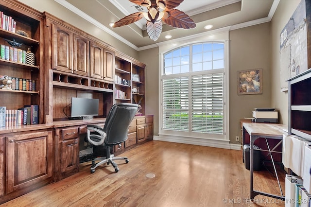 office with light wood-type flooring, crown molding, ceiling fan, and a healthy amount of sunlight