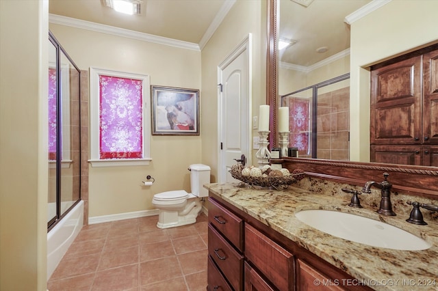 full bathroom with tile patterned flooring, toilet, bath / shower combo with glass door, and crown molding