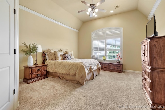 bedroom featuring light carpet, crown molding, ceiling fan, and lofted ceiling