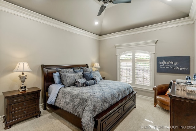 carpeted bedroom with ceiling fan, crown molding, and lofted ceiling