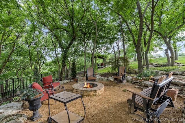 view of patio featuring a fire pit