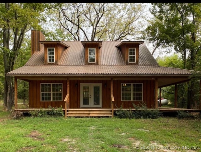 back of house with french doors and a porch