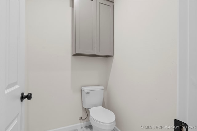 bathroom featuring toilet