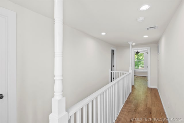 hallway featuring hardwood / wood-style floors