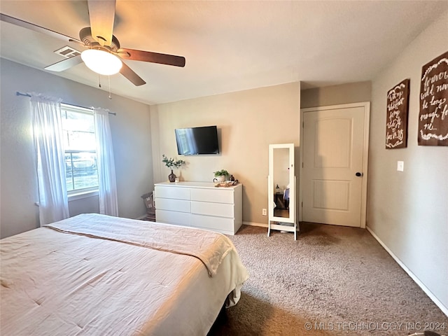 bedroom with carpet floors and ceiling fan