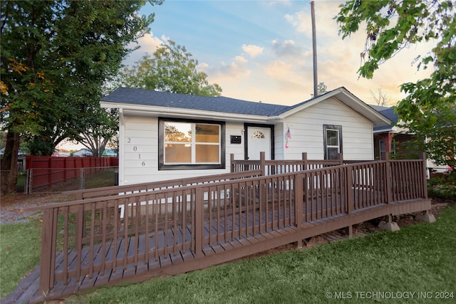 view of front of home with a wooden deck