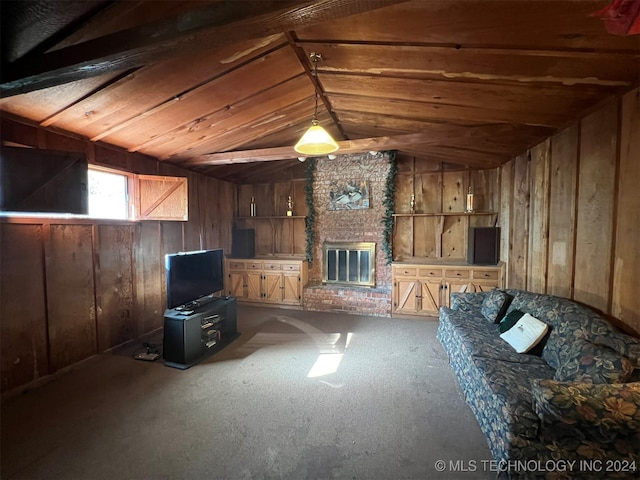 unfurnished living room with carpet, a brick fireplace, vaulted ceiling, and wooden walls