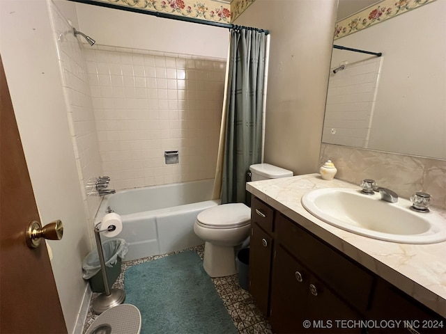 full bathroom featuring tile patterned flooring, vanity, shower / tub combo, and toilet