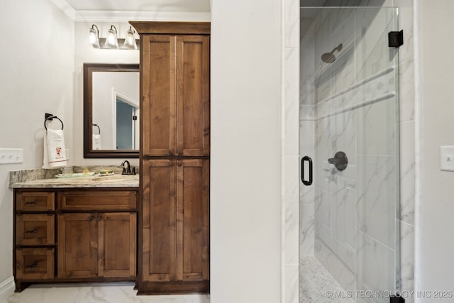 bathroom with walk in shower and vanity