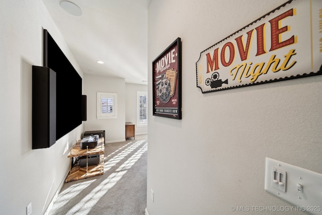 hallway featuring carpet floors