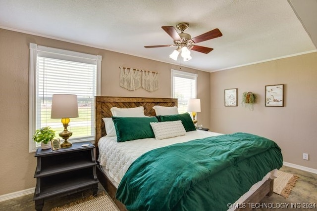 bedroom featuring ceiling fan, crown molding, and a textured ceiling