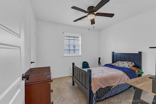 bedroom featuring ceiling fan and light colored carpet