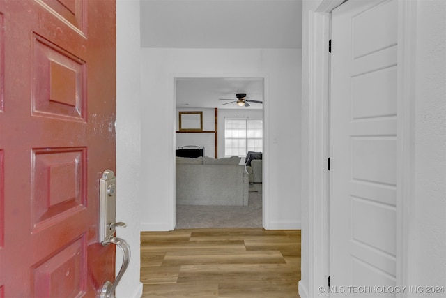 hallway featuring light wood-type flooring