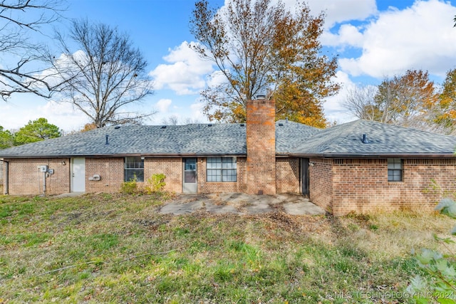 back of property featuring a patio area