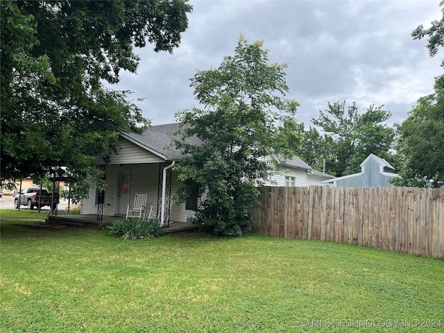 view of yard featuring a porch