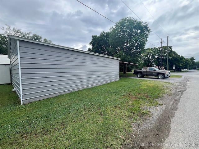 exterior space with a carport