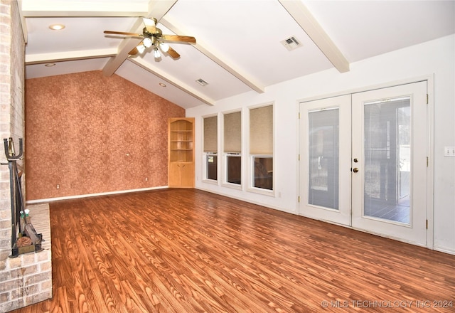 unfurnished living room with french doors, lofted ceiling with beams, ceiling fan, and wood-type flooring