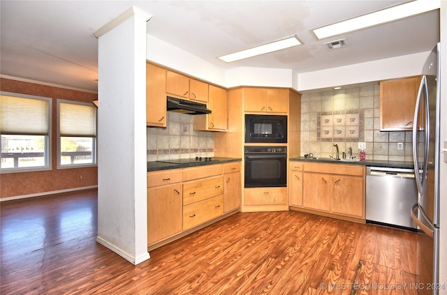 kitchen featuring decorative backsplash, sink, dark wood-type flooring, and black appliances