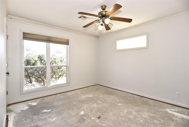 empty room with ceiling fan and ornamental molding