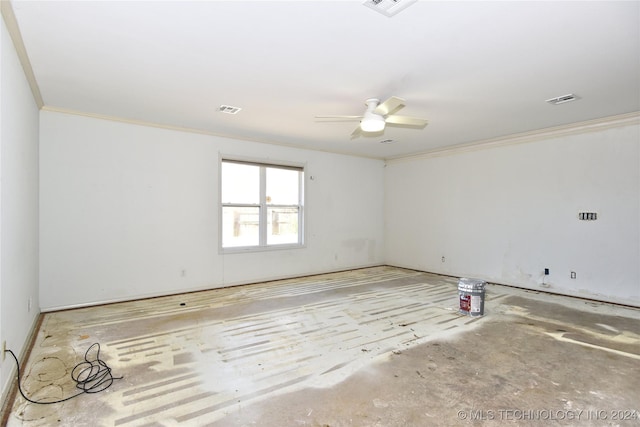 spare room with ceiling fan and crown molding