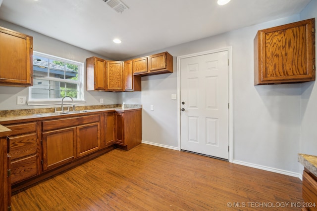 kitchen featuring sink and light hardwood / wood-style floors