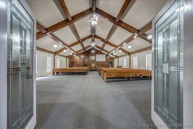 rec room with carpet flooring and lofted ceiling with beams