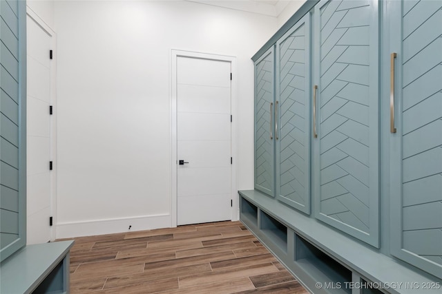 mudroom with light wood-style flooring