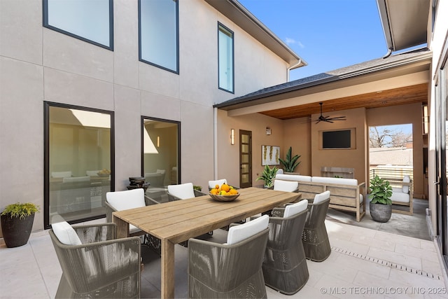 view of patio / terrace with outdoor lounge area, outdoor dining area, and ceiling fan