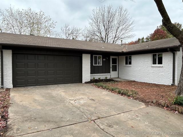 single story home with a garage