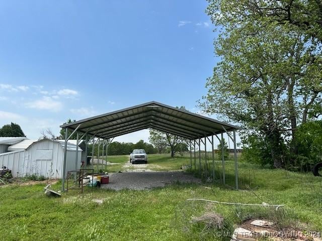 340 Clay Hl, Lone Grove, OK 73443 - view of car parking featuring a carport