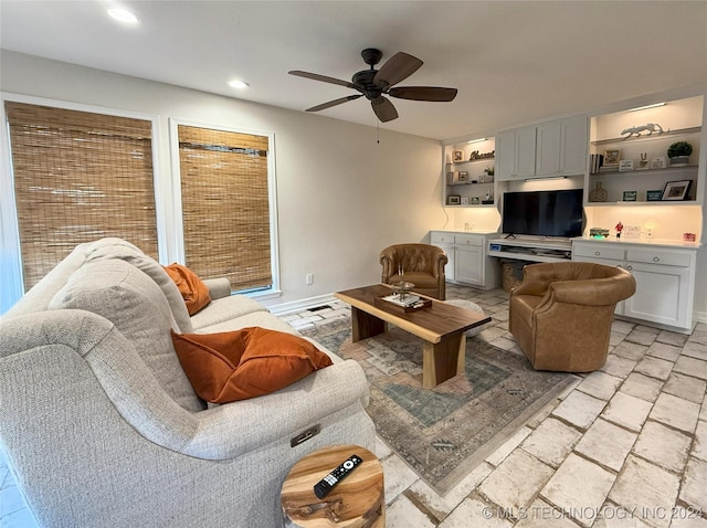 living room featuring ceiling fan