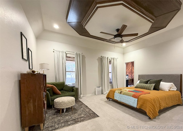 carpeted bedroom featuring ceiling fan and lofted ceiling