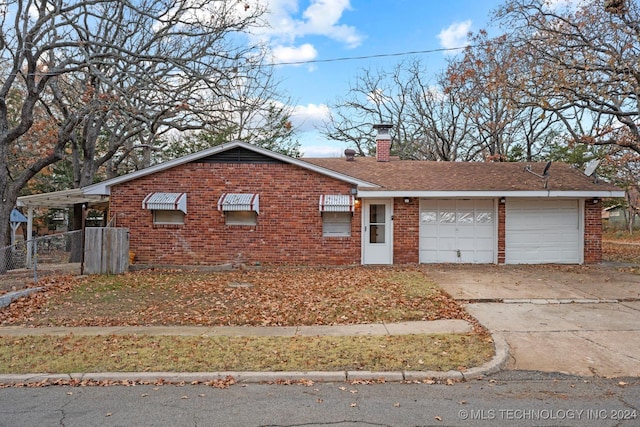 single story home featuring a garage