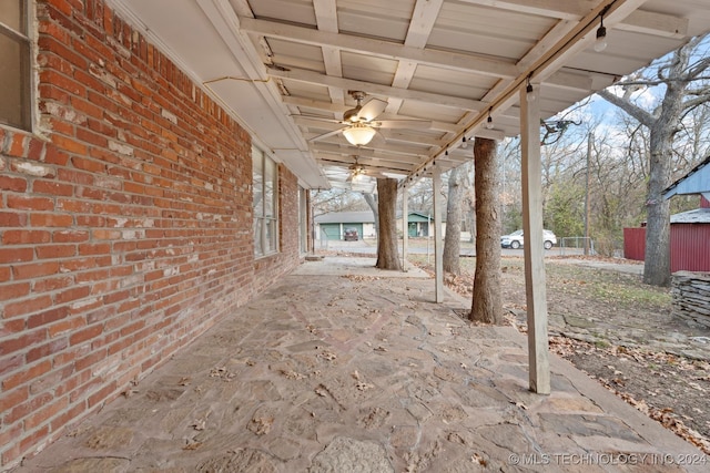 view of patio featuring ceiling fan