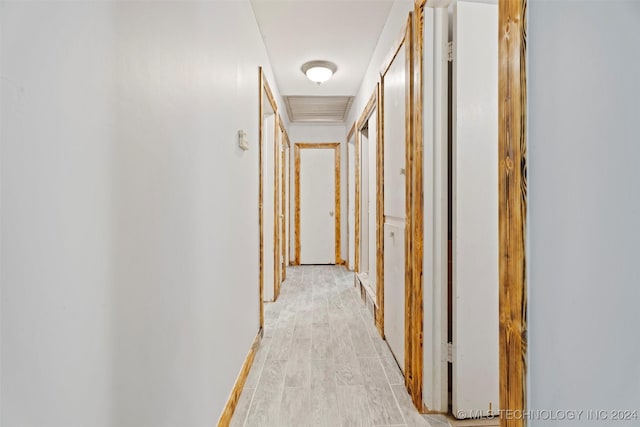 hallway featuring light wood-type flooring