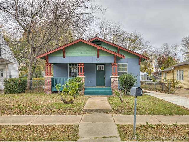 view of front facade featuring covered porch