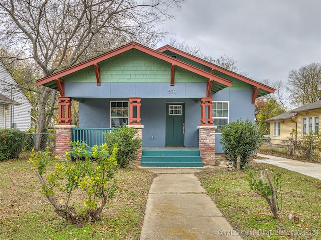 bungalow-style house with covered porch