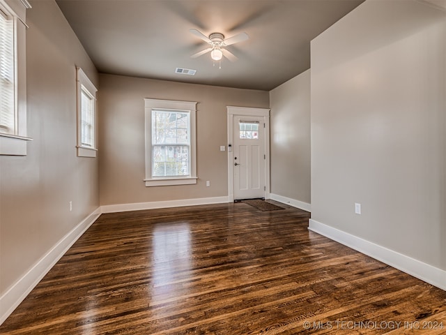 foyer featuring dark hardwood / wood-style flooring and ceiling fan