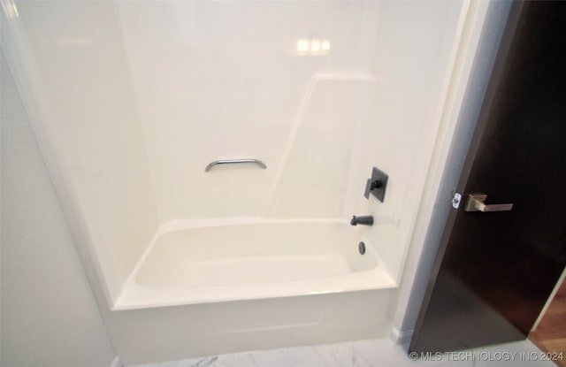 bathroom featuring shower / bath combination