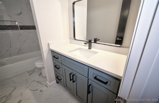 full bathroom featuring vanity, toilet, and tiled shower / bath combo