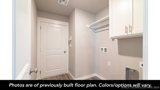 clothes washing area featuring hookup for an electric dryer, dark hardwood / wood-style flooring, cabinets, and hookup for a washing machine