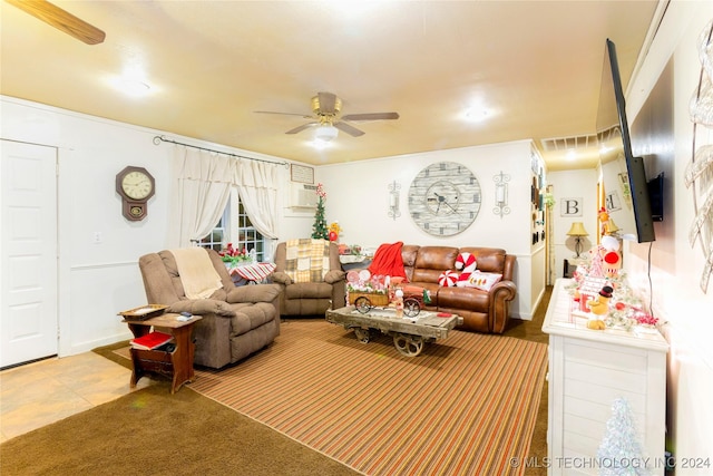 tiled living room with ceiling fan