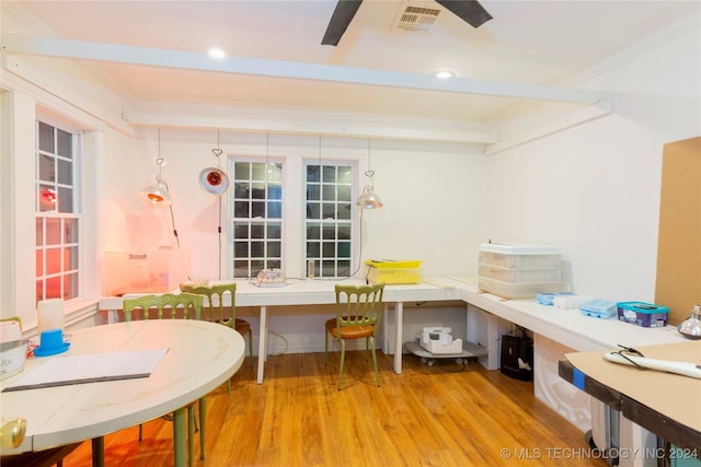 interior space featuring light hardwood / wood-style floors and ornamental molding