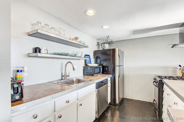 kitchen featuring white cabinets, sink, and stainless steel appliances