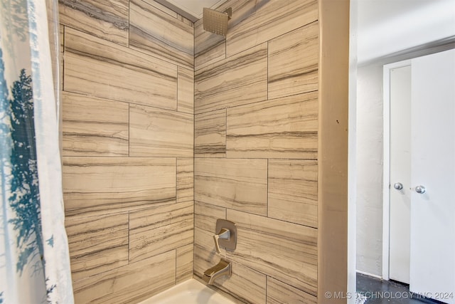 bathroom with shower / bathing tub combination