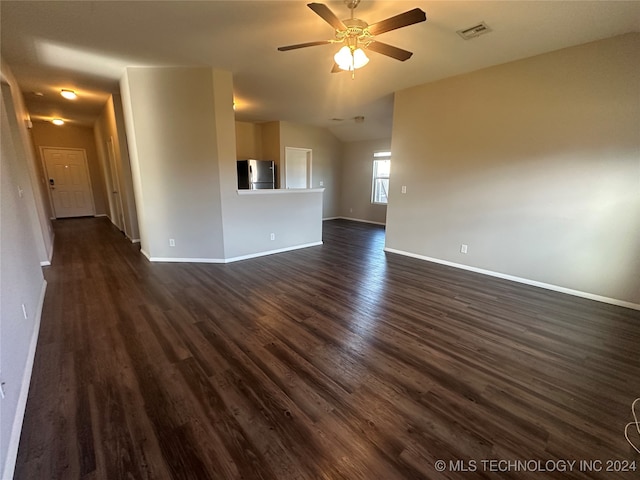 unfurnished living room featuring dark hardwood / wood-style floors and ceiling fan