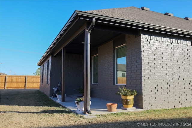 view of property exterior featuring a patio