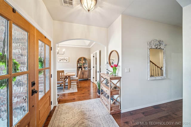 entryway with french doors and dark wood-type flooring