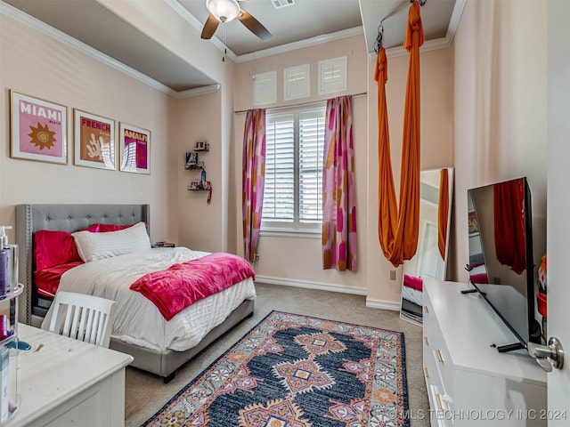 bedroom with ceiling fan, crown molding, and light colored carpet