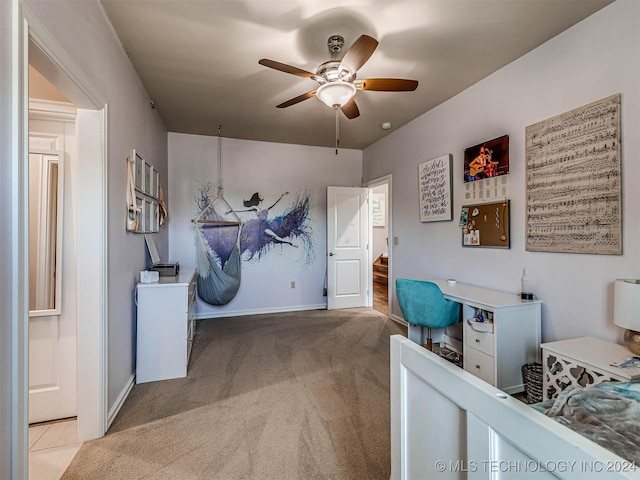 carpeted bedroom featuring ceiling fan